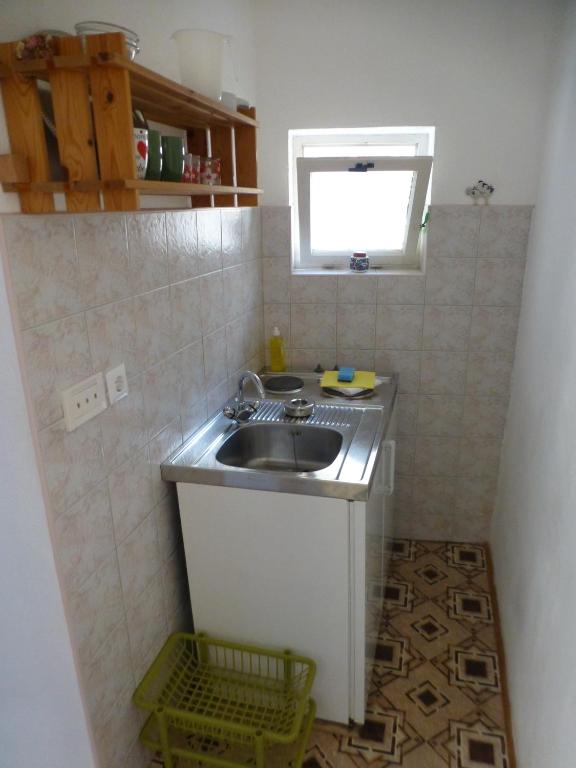 Kuchyň nebo kuchyňský kout v ubytování Guesthouse Bracanović
