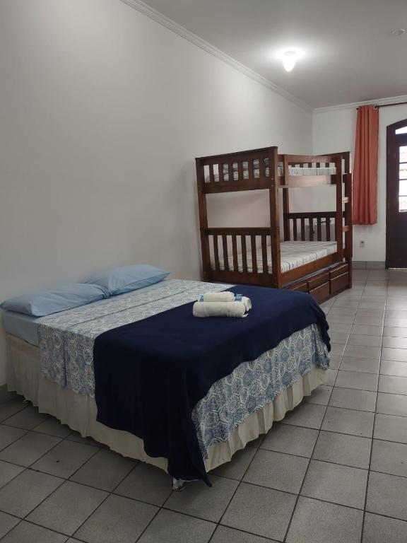 Postel nebo postele na pokoji v ubytování Pousada Caravelas - Centro de Paraty