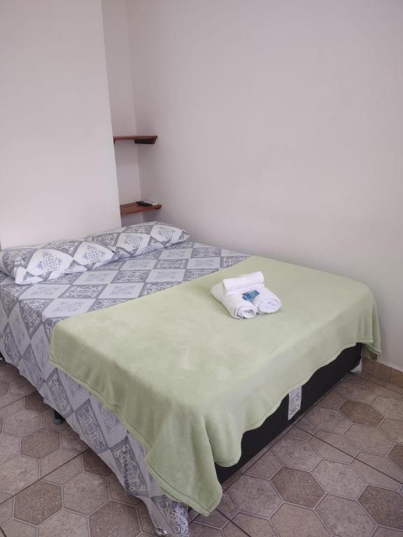 Postel nebo postele na pokoji v ubytování Pousada Caravelas - Centro de Paraty