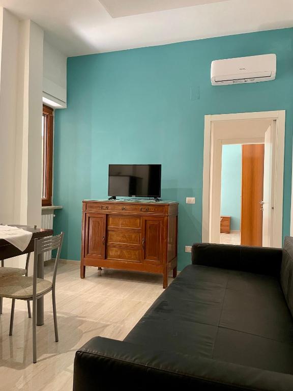 A television and/or entertainment centre at Il Cavaluccio Marino House