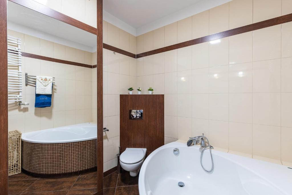 Fotografia z galérie ubytovania SuperApart Wilanowska 7, "Pet-Friendly with Elevator & Parking" vo Varšave