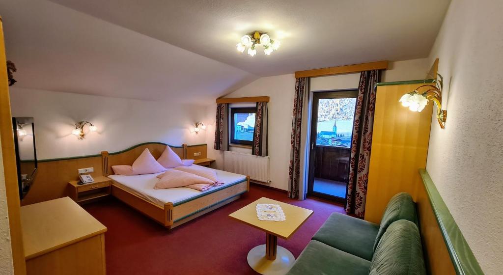 Posteľ alebo postele v izbe v ubytovaní Apart Garni Romantica
