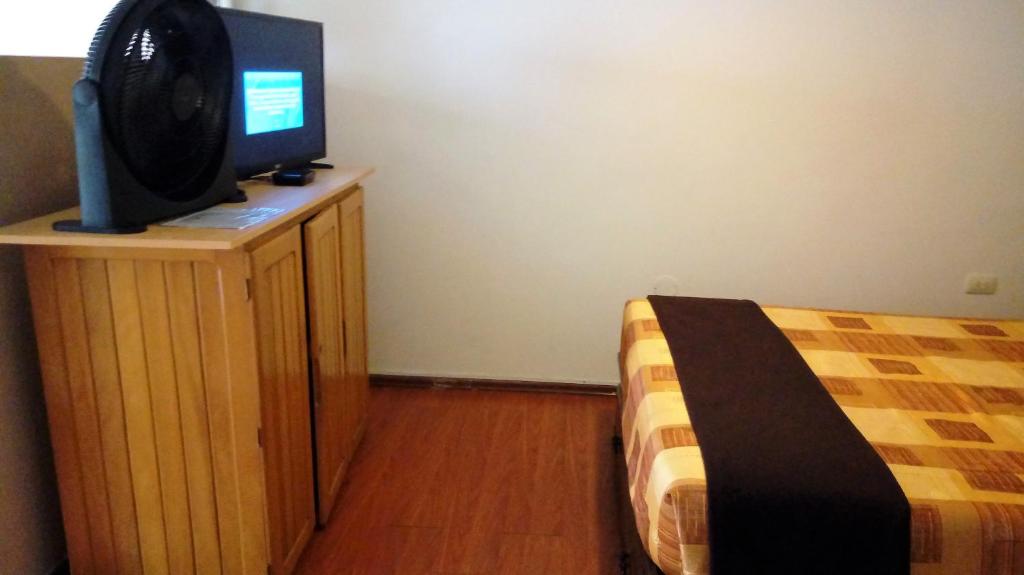 TV a/nebo společenská místnost v ubytování Hotel Pradera Verde Inn