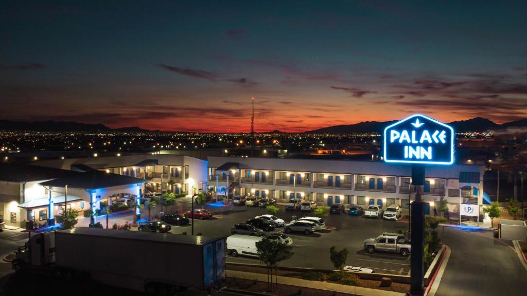 a pajax inn sign in front of a parking lot at Palace Inn El Paso in El Paso
