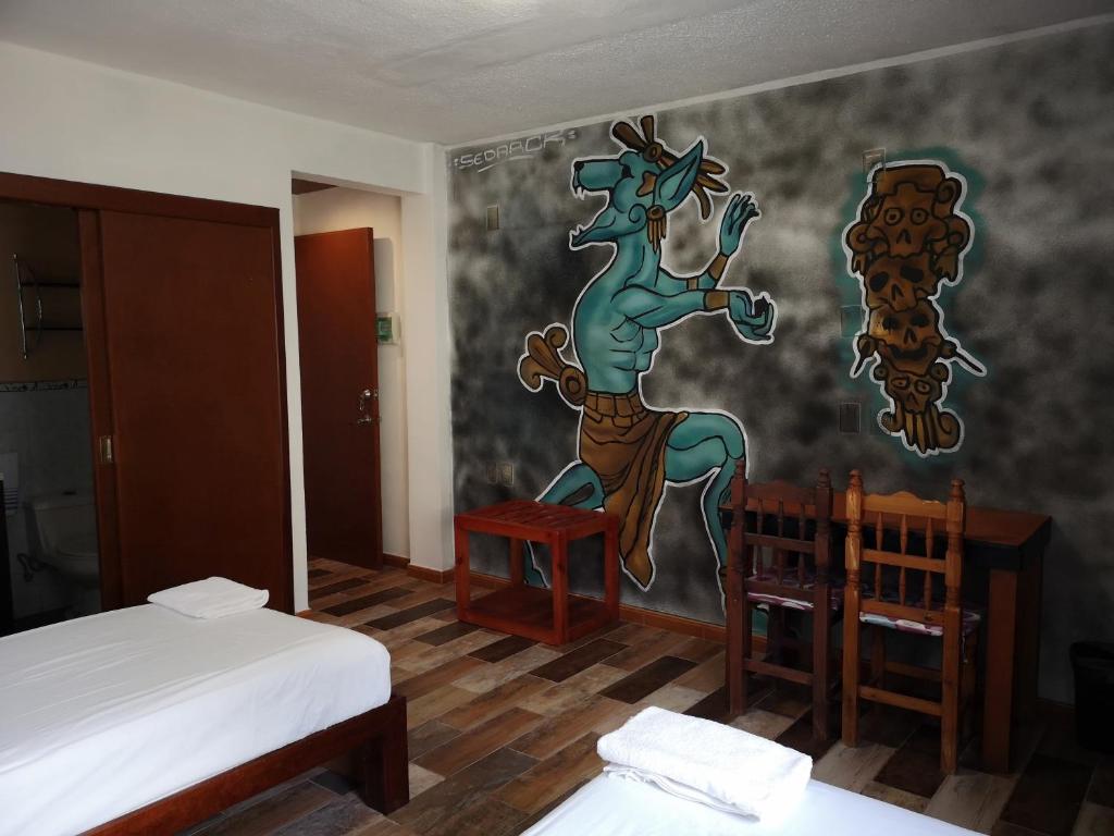 Postel nebo postele na pokoji v ubytování Xcalak Caribe Lodge