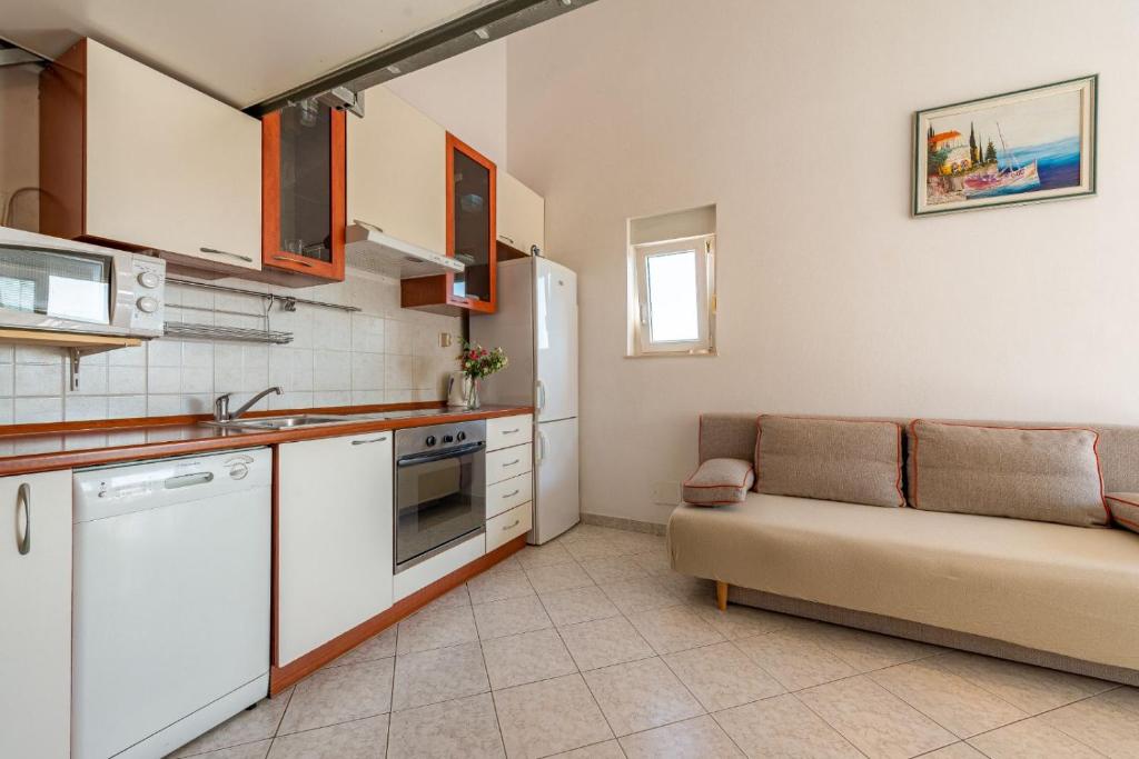 Kuchyňa alebo kuchynka v ubytovaní Apartman Petković