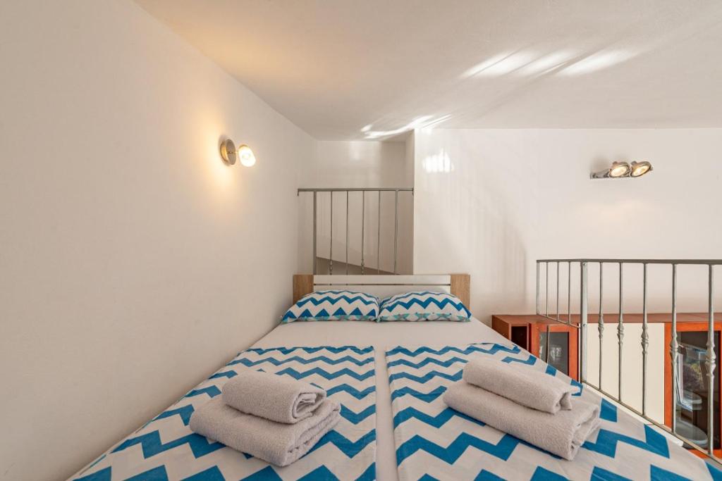 Posteľ alebo postele v izbe v ubytovaní Apartman Petković