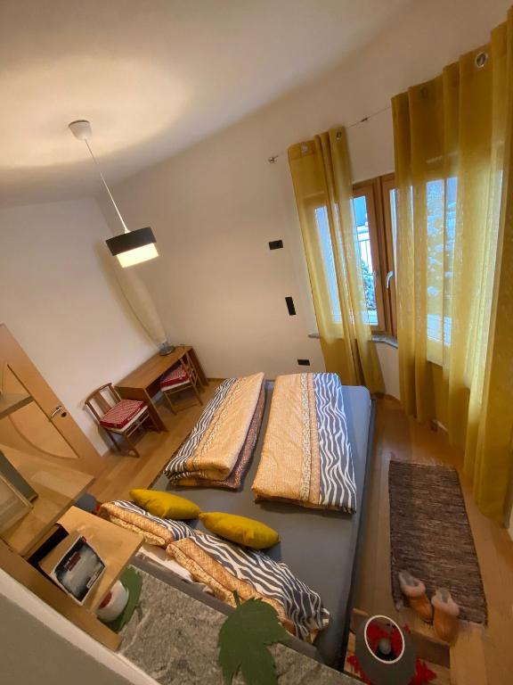 Postel nebo postele na pokoji v ubytování Villa Alessandra