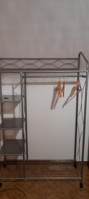 Palanda nebo palandy na pokoji v ubytování B&B Beglia Alguer - self check-in