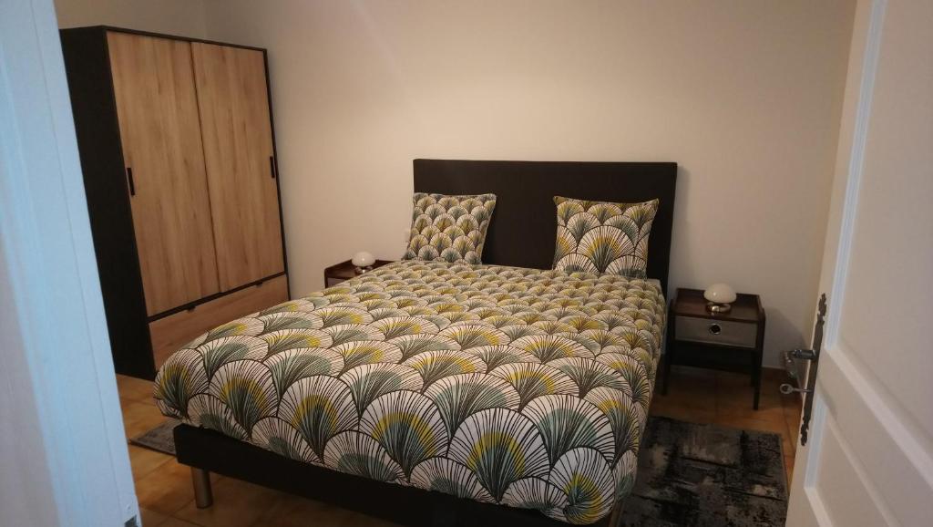 Ліжко або ліжка в номері Apart'Bellevue