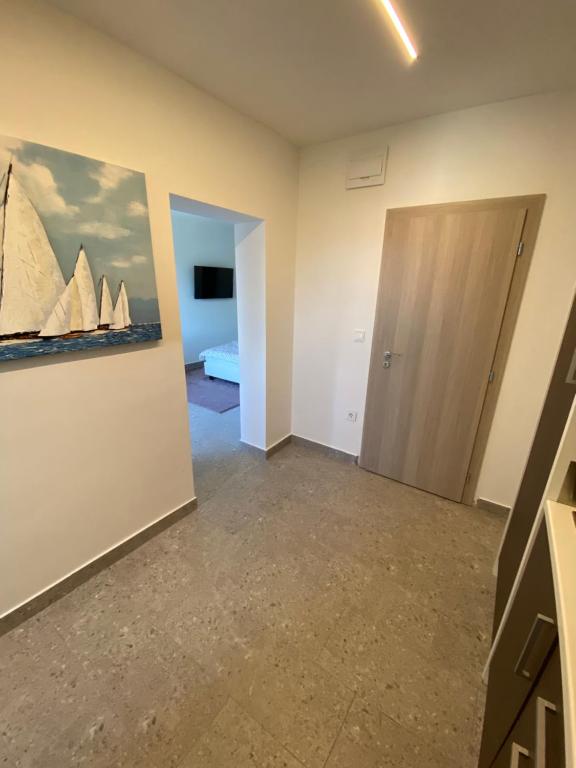 Fotografia z galérie ubytovania Apartmani Kumenat v destinácii Biograd na Moru