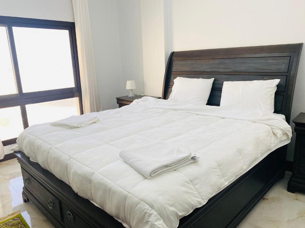 Postel nebo postele na pokoji v ubytování Alhama Hotel Appartment