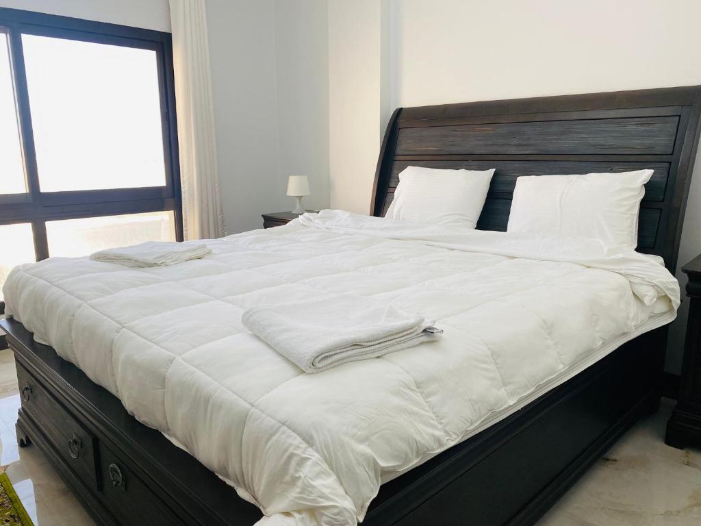 Postel nebo postele na pokoji v ubytování Alhama Hotel Appartment