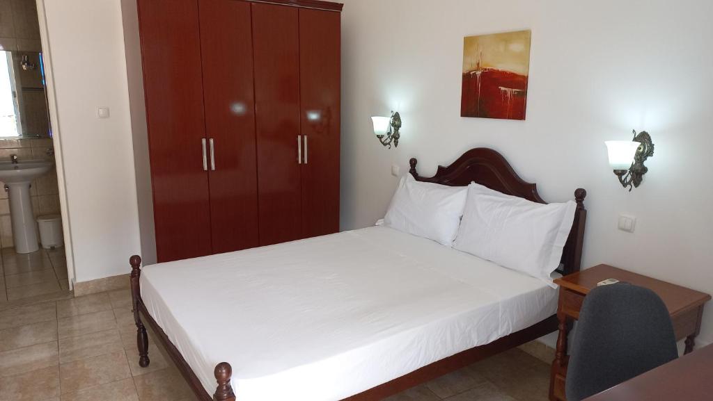 Postel nebo postele na pokoji v ubytování Hotel Savana