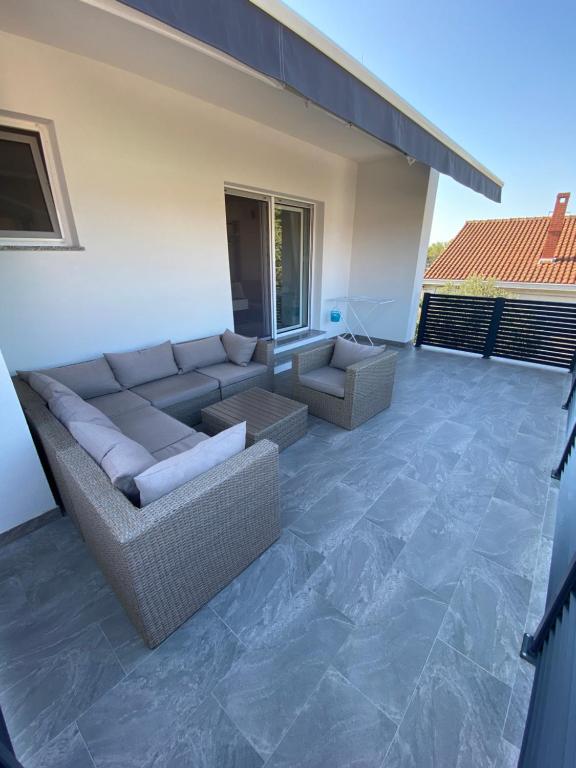 Posedenie v ubytovaní Apartmani Kumenat