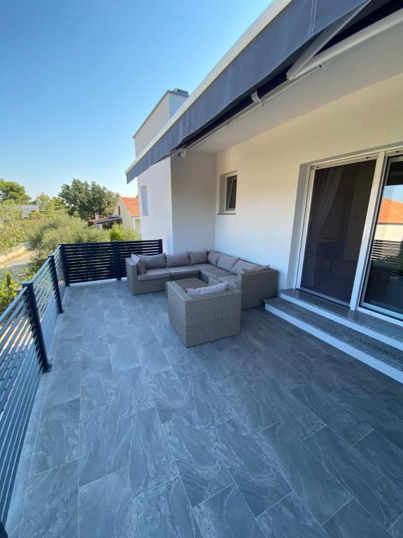 Balkón alebo terasa v ubytovaní Apartmani Kumenat