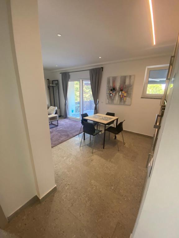 Posedenie v ubytovaní Apartmani Kumenat