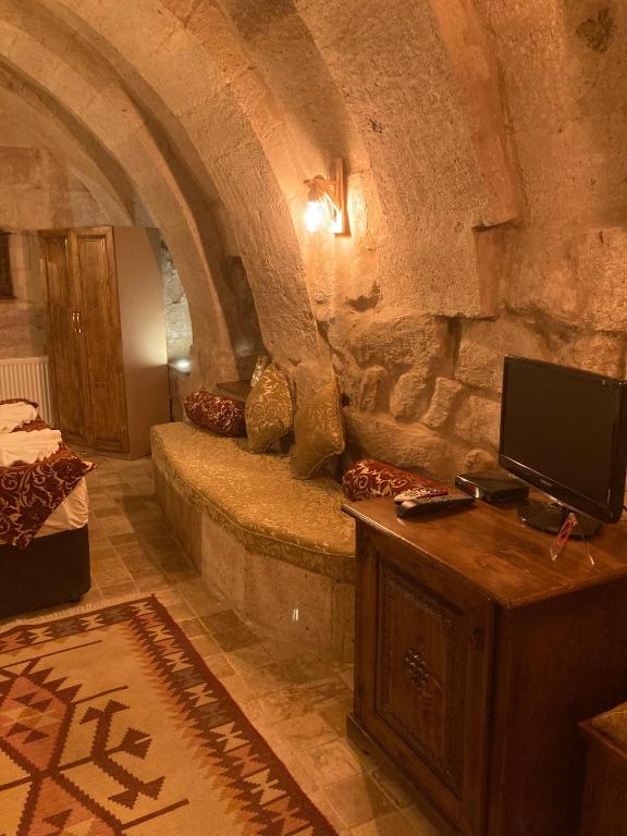 Posezení v ubytování Monte Cappa Cave House