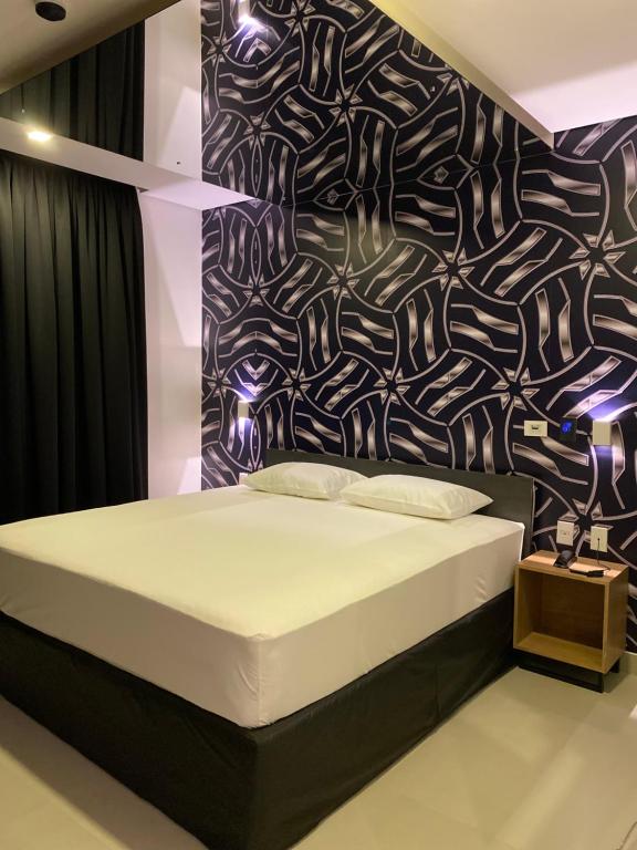 Postel nebo postele na pokoji v ubytování Drops Motel Manaus