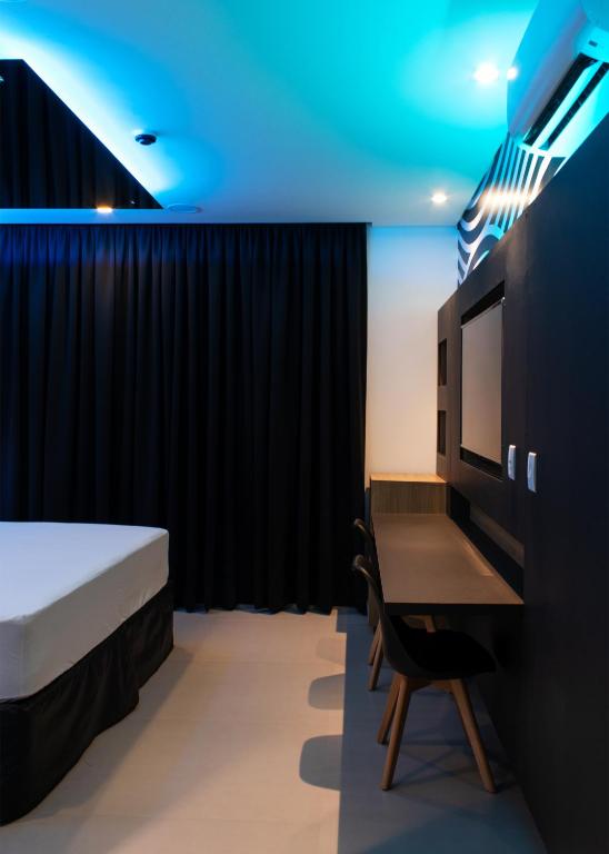 Postel nebo postele na pokoji v ubytování Drops Motel Manaus