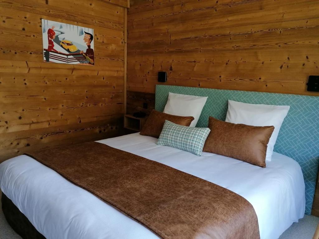 Postel nebo postele na pokoji v ubytování Hotel L'Edelweiss