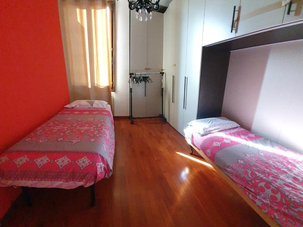 Posteľ alebo postele v izbe v ubytovaní Casa Cristina