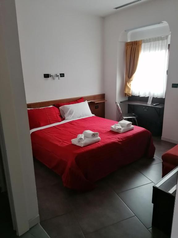 Postel nebo postele na pokoji v ubytování Accomodation Verona - City Centre