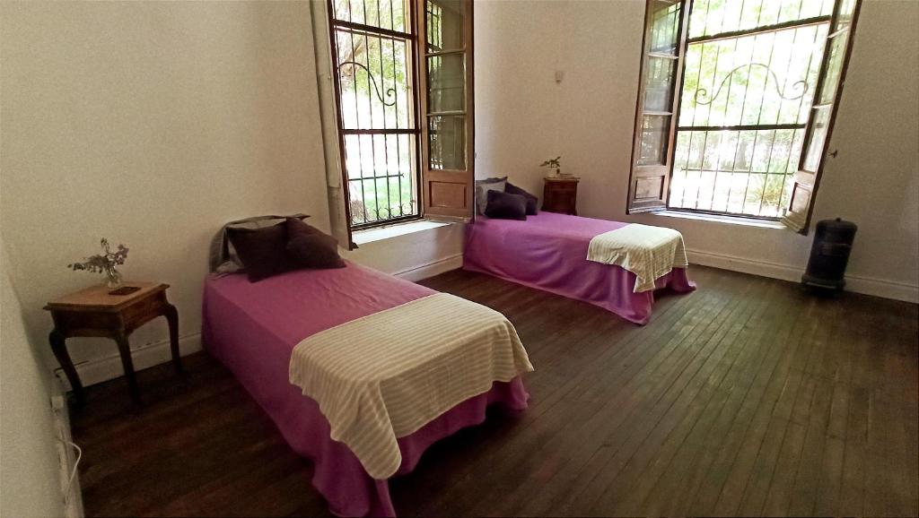 Cama o camas de una habitación en Bed & Breakfast - Habitaciones Privadas - Baño compartido - NOMADI