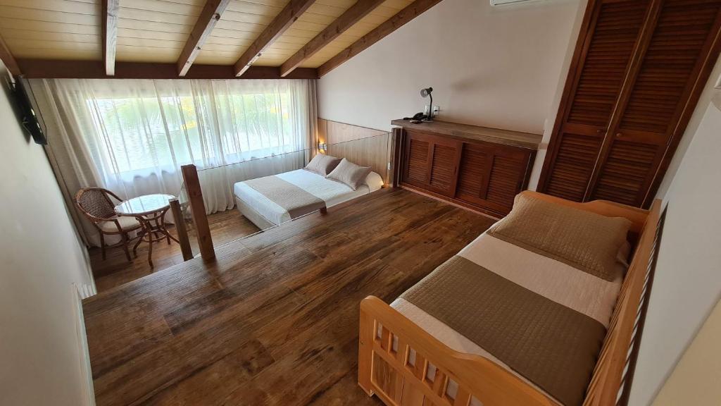 Cama ou camas em um quarto em Hotel Atalaia do Mariscal