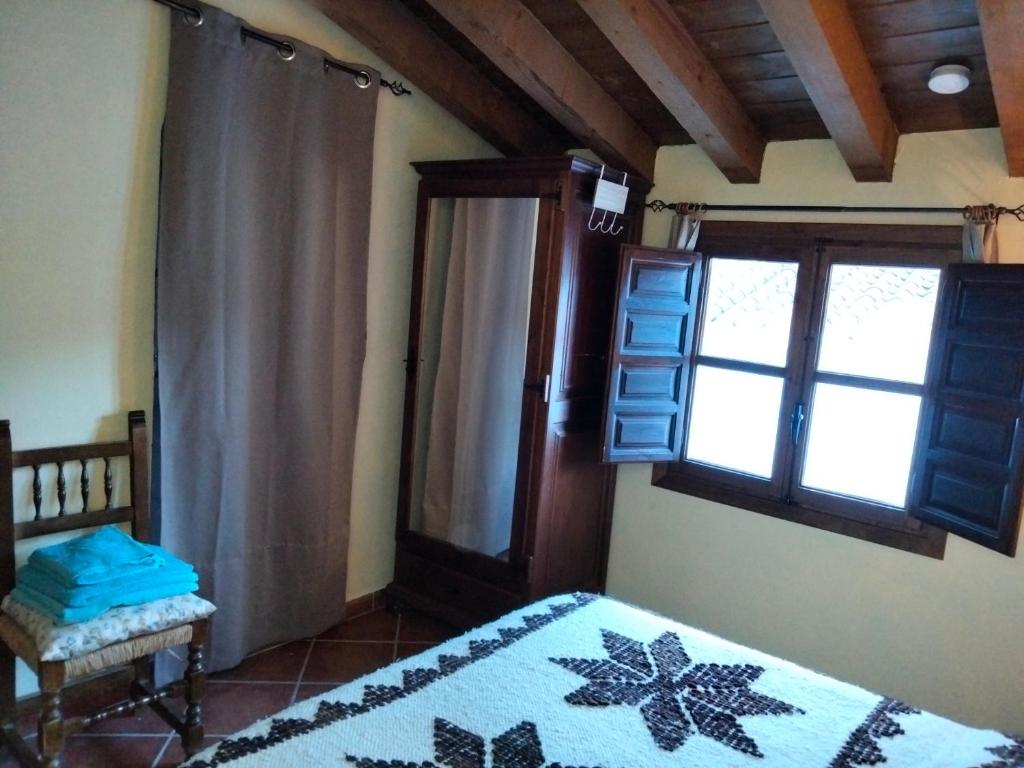 Cama o camas de una habitación en B&B the lost Village el Acebuchal