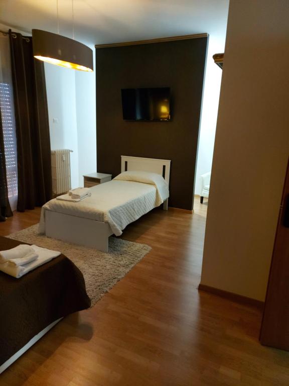 Postel nebo postele na pokoji v ubytování B&B Viviani Potenza