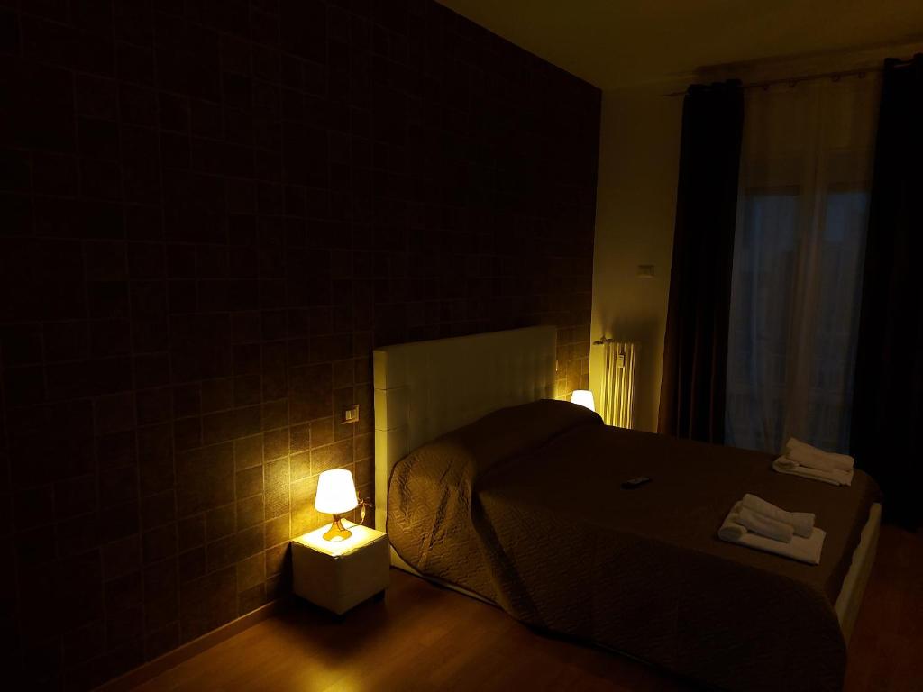 Postel nebo postele na pokoji v ubytování B&B Viviani Potenza