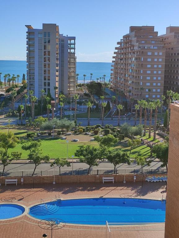 Bazén v ubytování Disfruta Torremar - segunda línea playa nebo v jeho okolí