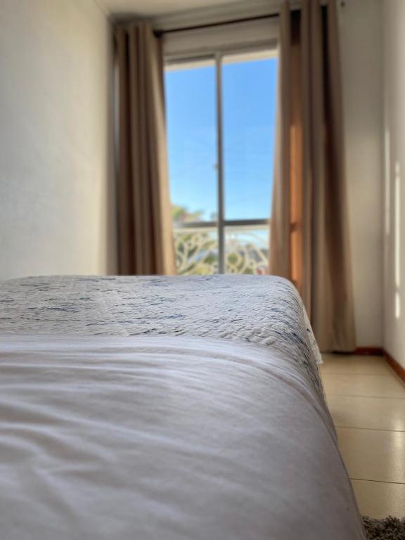 Postel nebo postele na pokoji v ubytování Hotel Vidal