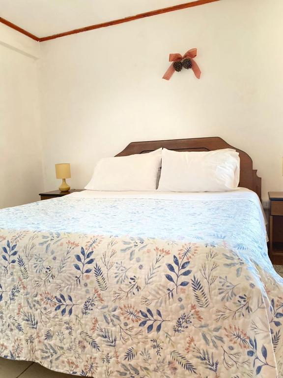 Postel nebo postele na pokoji v ubytování Hotel Vidal
