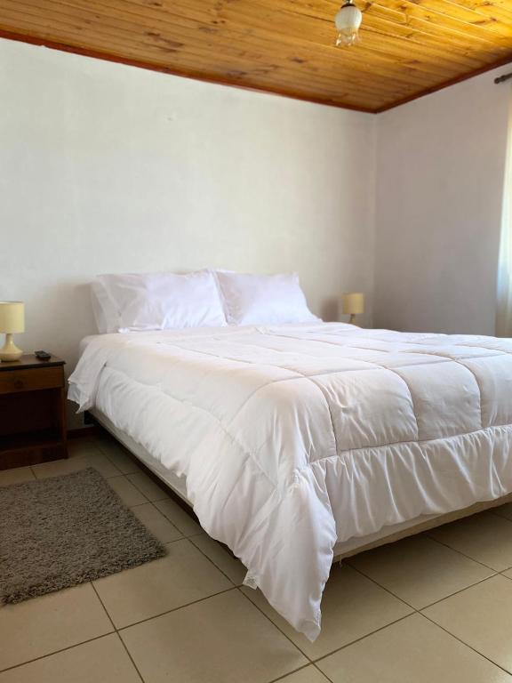Postel nebo postele na pokoji v ubytování Hotel Vidal