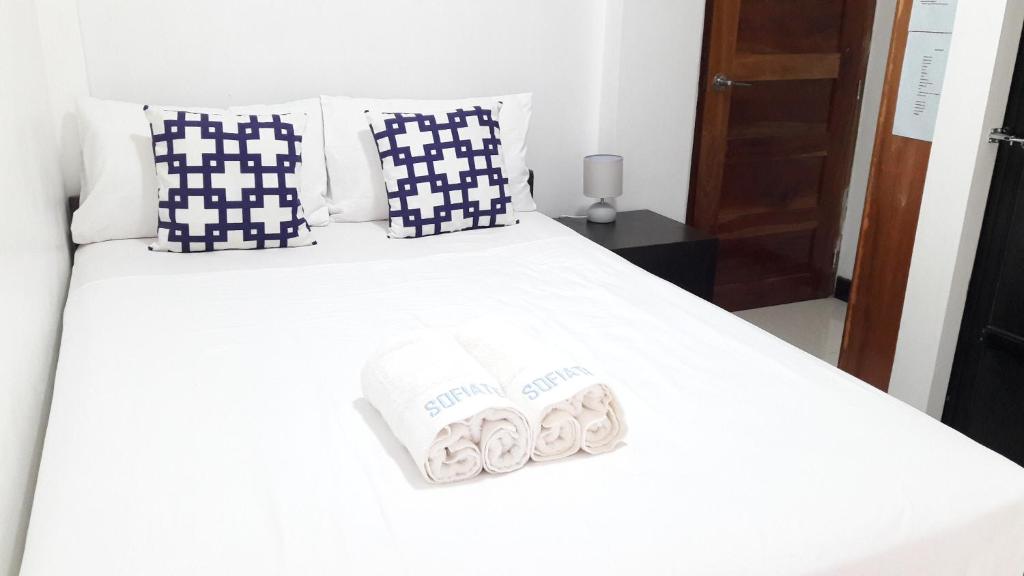 Postel nebo postele na pokoji v ubytování SOFIATEL Rooms