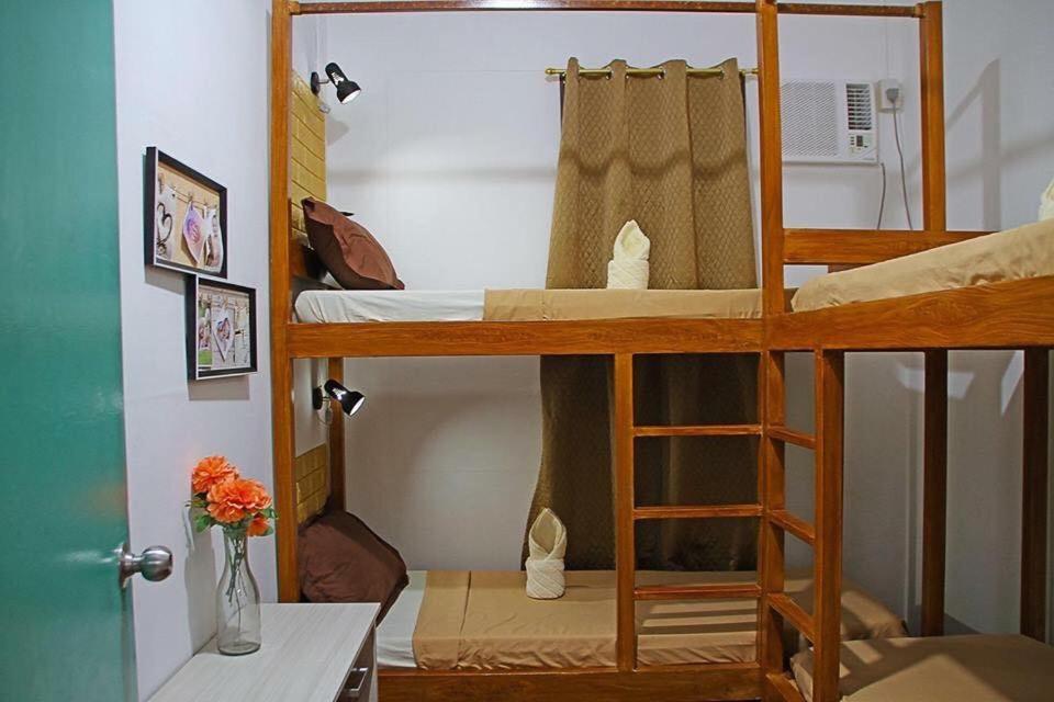 Postel nebo postele na pokoji v ubytování Prim Travellers Inn