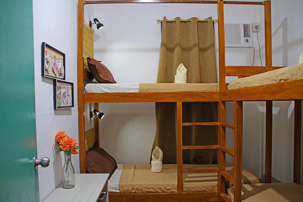 Postel nebo postele na pokoji v ubytování Prim Travellers Inn