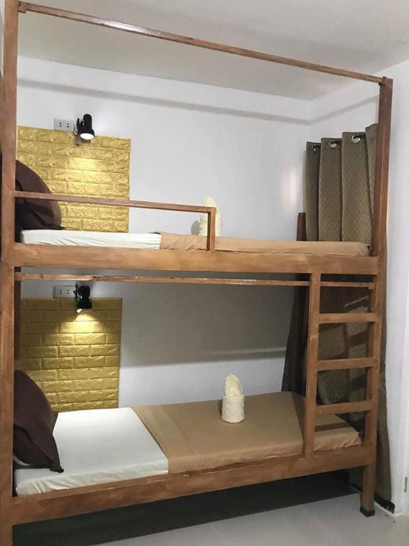 Postel nebo postele na pokoji v ubytování Prim Travellers Inn