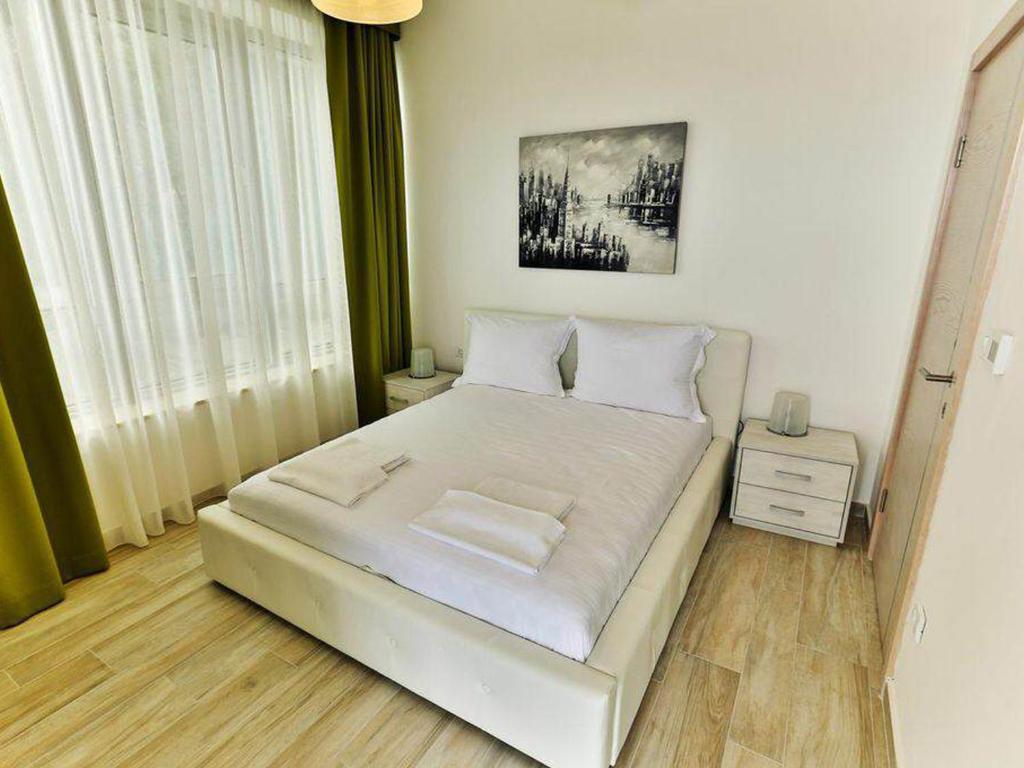 Postel nebo postele na pokoji v ubytování Apart Hotel Sea Fort