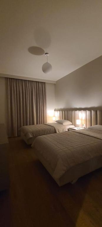 Krevet ili kreveti u jedinici u okviru objekta Four Seasons Vlora