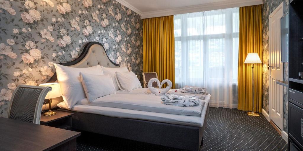 Postel nebo postele na pokoji v ubytování Thon Hotel Sandven