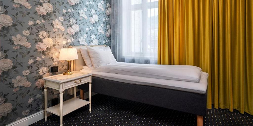 Postel nebo postele na pokoji v ubytování Thon Hotel Sandven