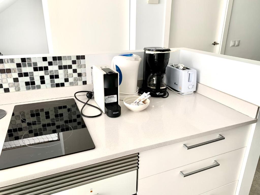 A kitchen or kitchenette at Edifici Valeria