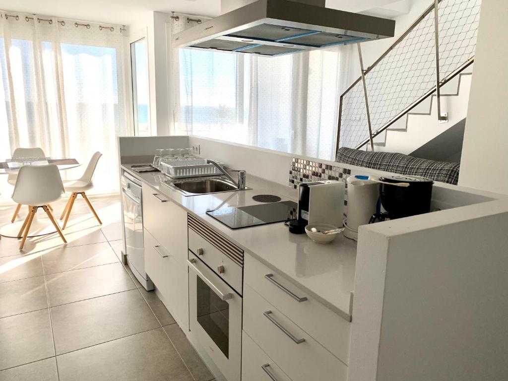 A kitchen or kitchenette at Edifici Valeria