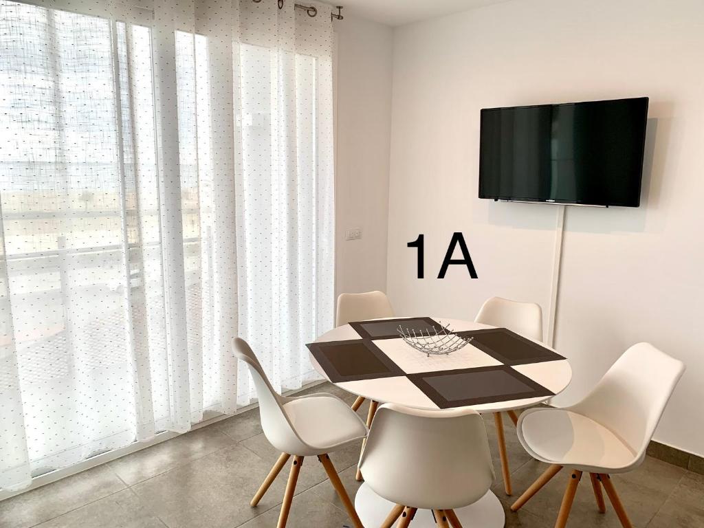 A television and/or entertainment centre at Edifici Valeria