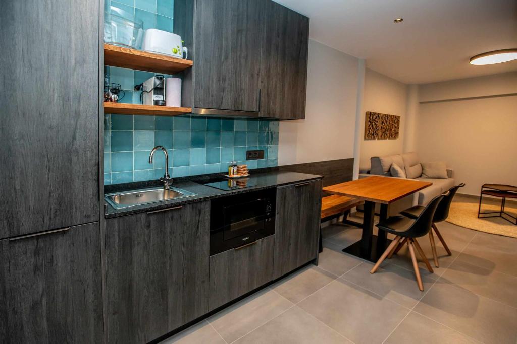 Kuchyň nebo kuchyňský kout v ubytování Mochorural home adaptado