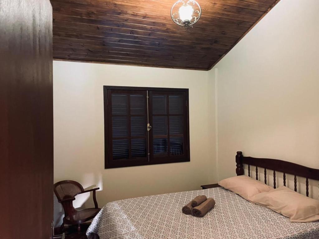 Letto o letti in una camera di Refúgio das Araucárias