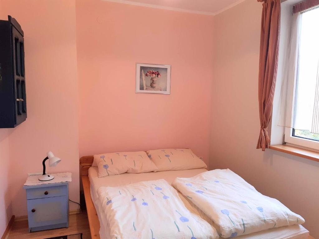 Posteľ alebo postele v izbe v ubytovaní Villa Paula Pluski